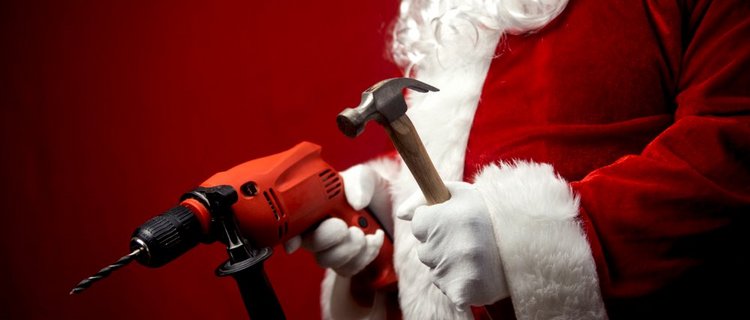 Father,Santa,Claus,Holding,Using,Electric,Drill,And,Hammer,Tools