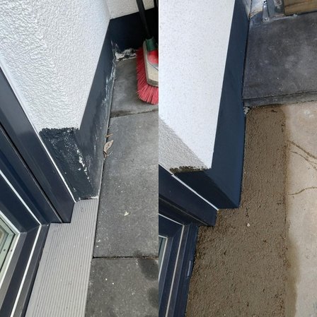 Ecke an Balkontuer mit schwarzer Dichtmasse am Sockel und Steinplattenboden