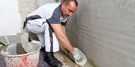 Prepare masonry and apply ISOTEC sealing plaster